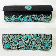 Load image into Gallery viewer, Designer black silk clutch bag embroidered with turquoise blue flowers and embellished with emeralds, front and rear view.