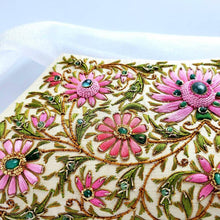 Load image into Gallery viewer, Gold silk clutch embroidered with pink flowers and embellished with emeralds, zardozi handbag, close up view.