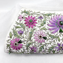Load image into Gallery viewer, Hand embroidered luxury white silk clutch embroidered with lavender and pink flowers and embellished with emeralds and rubies, zardozi clutch bag, close up.