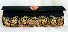 Load image into Gallery viewer, Luxury black silk clutch bag embroidered with orange flowers all over and embellished with ruby cabochons, zardozi purse.
