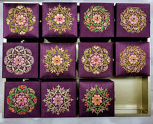 Load image into Gallery viewer, Set of eleven small square purple silk gift boxes, jewelry boxes with multicolor embroidered flowers and star ruby, zardozi box