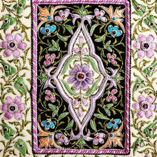 Load image into Gallery viewer, Embroidered lavender purple silk jewel carpet wall hanging in floral pattern, embroidered purple and pink flowers on black velvet tapestry, zardozi tapestry, close up view. 
