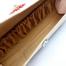 Load image into Gallery viewer, Pale gold silk clutch embroidered with multicolor silk flowers and embellished with star rubies, zardozi purse, interior view showing full length gathered pocket.