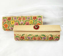Load image into Gallery viewer, Pale gold silk clutch embroidered with multicolor silk flowers and embellished with star rubies, zardozi purse, front and back view.