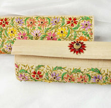 Load image into Gallery viewer, Pale gold silk clutch embroidered with multicolor silk flowers and embellished with star rubies, zardozi purse, front and back view.