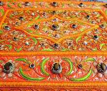 Load image into Gallery viewer, Embroidered jewel carpet wall hanging in orange floral pattern and tiger eye stones, embroidered orange silk flowers on orange velvet, zardozi tapestry, close up view.