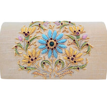 Load image into Gallery viewer, Luxury gold silk evening clutch bag embroidered with large central blue floral wreath in blue and embellished with genuine lapis lazuli and garnet gemstones, floral wedding clutch, gold blue zardozi purse. 
