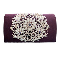 Load image into Gallery viewer, Luxury eggplant purple evening clutch bag embroidered with large silver white central floral wreath and embellished with genuine lapis lazuli and garnet gemstones, floral wedding clutch, purple white zardozi purse. 
