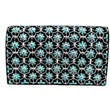 Load image into Gallery viewer, Luxury black velvet evening clutch bag embroidered with silver quatrefoil cloverleaf pattern and teal flowers and embellished with genuine garnet gemstones, floral wedding clutch, silver black blue zardozi purse.
