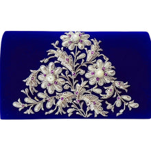 Load image into Gallery viewer, Luxury cobalt blue velvet evening clutch bag embroidered with a bouquet of three silver flowers and embellished with genuine moonstone and amethyst gemstones, floral wedding clutch, blue and silver zardozi purse.
