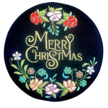 Load image into Gallery viewer, Black velvet round gift presentation box embroidered with metallic gold words Merry Christmas BoutiqueByMariam.

