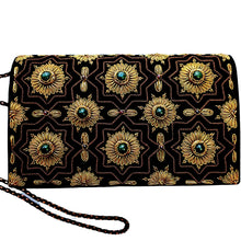 Load image into Gallery viewer, Black velvet clutch bag embroidered with gold and copper stars and inlaid with jade gemstones BoutiqueByMariam.
