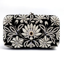 Load image into Gallery viewer, Black velvet hard case clutch embroidered with silver and white lotus flower inlaid with amethyst stone BoutiqueByMariam.

