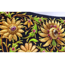 Load image into Gallery viewer, Black and gold embroidered clutch with citrine stone and rubies, close up view. 
