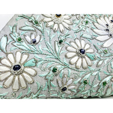 Load image into Gallery viewer, Luxury hand embroidered gray silk handbag with white silk flowers and blue sapphire beads, zardozi embroidery. 
