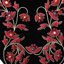 Load image into Gallery viewer, Hand embroidered red and gold vines and flowers on black velvet crossbody bag, zardozi embroidery, close up view. 
