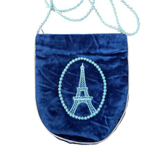 Load image into Gallery viewer, Eiffel Tower hand embroidered on a blue velvet crossbody bag, outlined with turquoise beads, zardozi purse. 
