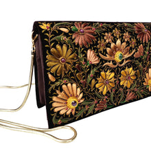 Load image into Gallery viewer, Exclusive brown velvet evening clutch bag hand embroidered with brown and gold flowers and embellished with rubies and onyx, zardozi, side view. 
