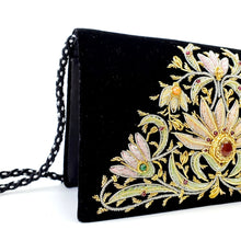 Load image into Gallery viewer, Hand embroidered pastel pink and orange flowers on black velvet evening bag,, zardozi, side view. 
