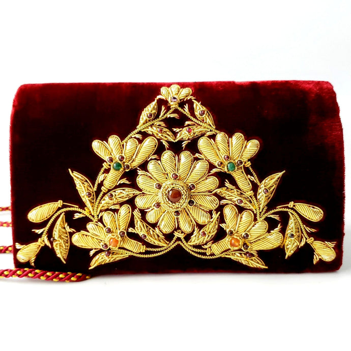 Designer dark merlot colored handbag with gold floral embroidery, zardozi. 