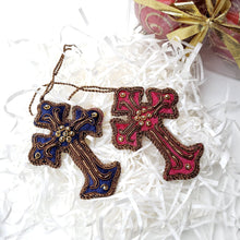 Load image into Gallery viewer, Hand embroidered pink or blue velvet cross ornament with bead work.
