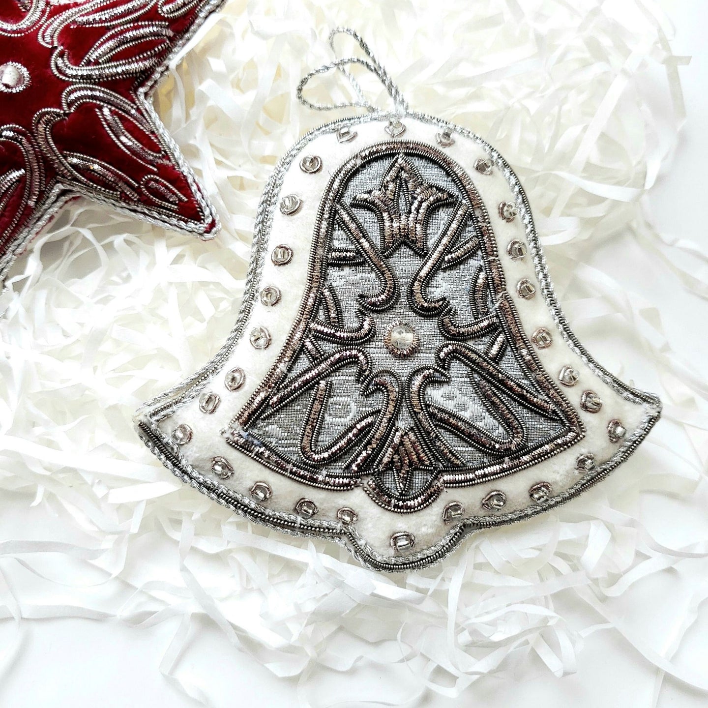 Hand embroidered silver and white velvet bell hanging holiday ornament. 