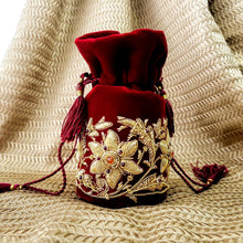 Load image into Gallery viewer, Red velvet mini potli bag embroidered with gold flowers, zardozi potli bag. 
