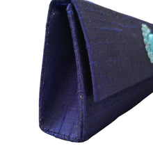 Load image into Gallery viewer, Navy blue slim silk clutch, side view. 
