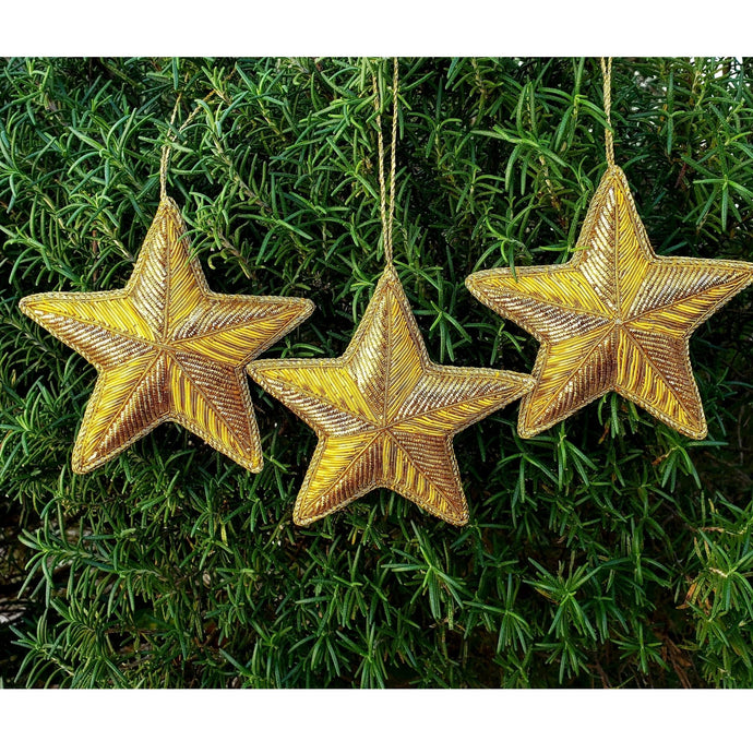Set of  three Texas gold star Christmas tree hanging ornaments.
