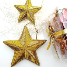 Load image into Gallery viewer, Large and small hand made metallic yellow gold star hanging ornament for Christmas tree. 
