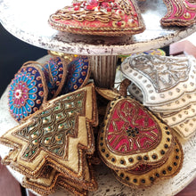 Load image into Gallery viewer, Tray of hand made and hand embroidered luxury hanging Christmas ornaments. 
