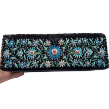 Load image into Gallery viewer, Luxury black velvet jewelry box embroidered with blue flowers and inlaid with rubies, front view. 
