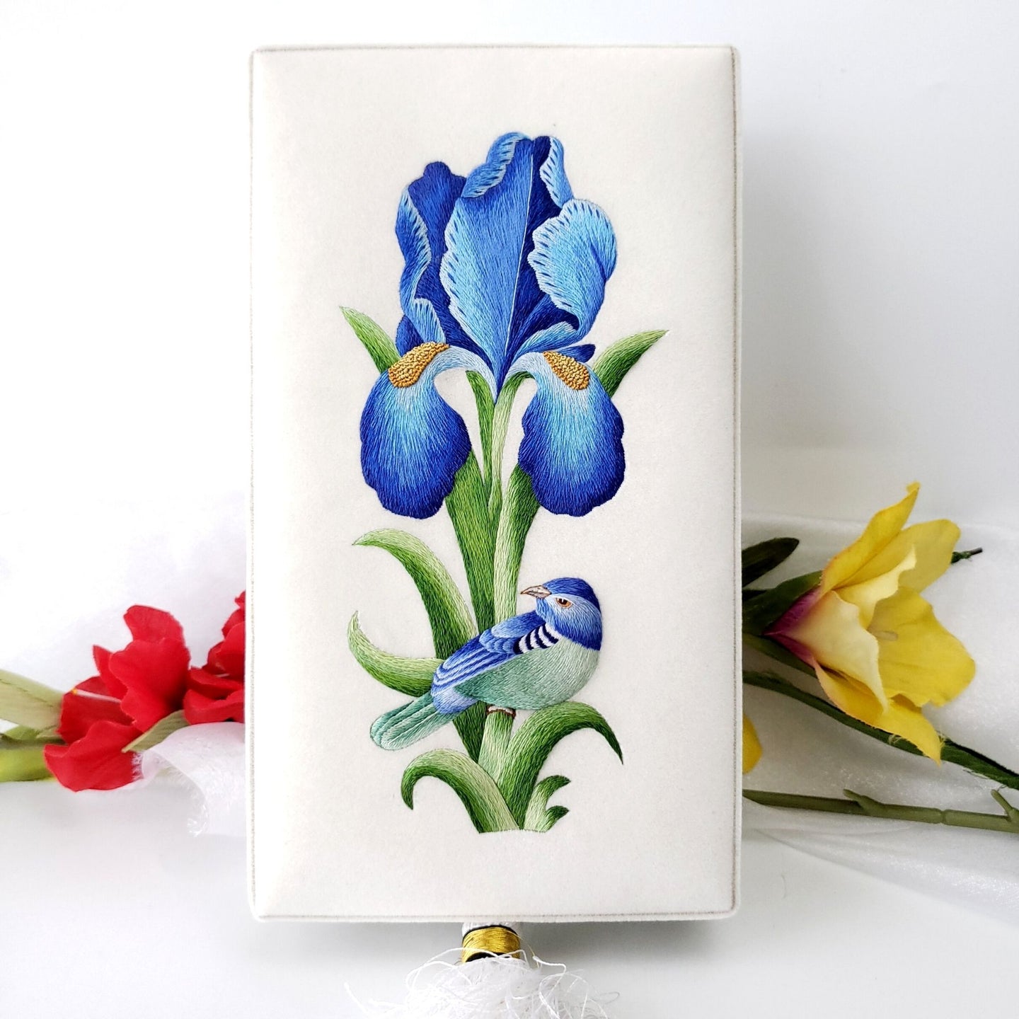 Embroidered blue bird and blue iris flower on ivory velvet keepsake box with tassel. 