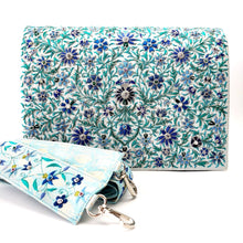 Load image into Gallery viewer, Embroidered blue flowers on white silk iPad case briefcase with strap BoutiqueByMariam.
