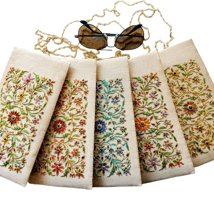 Five gold beige soft sunglasses cases, eyeglasses cases,, hand embroidered with colorful flowers.  