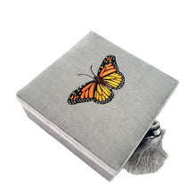 Load image into Gallery viewer, Gray velvet decorative keepsake box hand embroidered with orange monarch butterfly.
