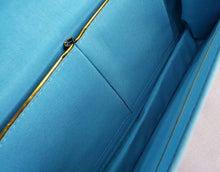 Load image into Gallery viewer, Interior view teal blue silk handbag BoutiqueByMariam.
