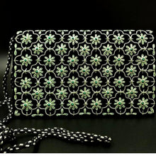 Load image into Gallery viewer, Luxury black velvet evening clutch bag embroidered in cloverleaf pattern with green flowers and green onyx. 
