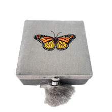 Load image into Gallery viewer, Orange monarch butterfly hand embroidered on gray velvet keepsake box, jewelry storage box. 
