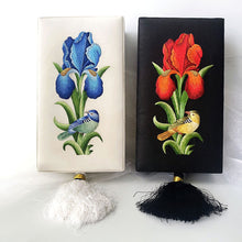 Load image into Gallery viewer, Two hand embroidered boxes, blue bird and iris flower on ivory velvet, beige bird and red iris flower on black silk. 

