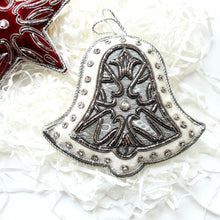 Load image into Gallery viewer, Hand embroidered white velvet bell Christmas ornament with silver accents. 
