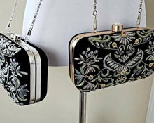 Load image into Gallery viewer, Two black velvet zardozi clutch bags with gray embroidery, silver tone or gold tone hardware. 
