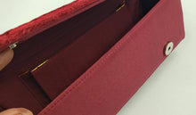 Load image into Gallery viewer, Luxury burgundy red velvet clutch bag embroidered with gold metallic flowers and embellished with rubies, zardozi purse, interior view.

