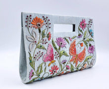 Load image into Gallery viewer, Gray silk top handle bag embroidered with silk butterflies and flowers and embellished with star rubies, zardozi purse, side view.
