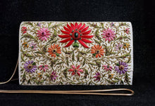 Load image into Gallery viewer, Ivory silk clutch bag embroidered with red and multicolor silk flowers with gold tone chain, zardozi evening bag.
