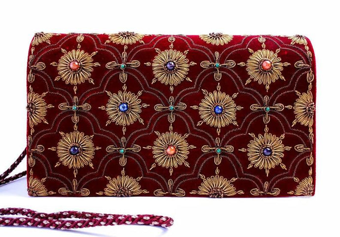 Burgundy velvet clutch bag embroidered with copper metallic flowers and embellished with semi precious stones, cord strap, zardozi evening bag.