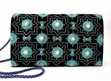 Load image into Gallery viewer, Navy blue velvet clutch bag embroidered with silver and teal art deco inspired design and embellished with semi precious stones, zardozi evening bag, cord strap. 
