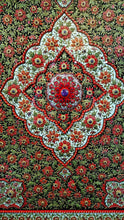 Load image into Gallery viewer, Hand embroidered red floral silk tapestry wall hanging, zardozi jewel carpet wall art, framed, close up view of central medallion. 
