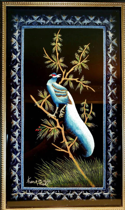 Framed embroidered bird tapestry, embroidered blue silk pheasant on black velvet with ornate border, zardozi tapestry. 