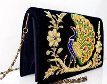 Load image into Gallery viewer, Peacock embroidered black velvet clutch, zardozi evening bag, side view. 
